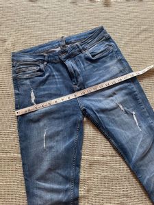 Distressed Slim Fit Jeans
