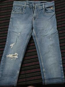 Distressed Denim Jeans