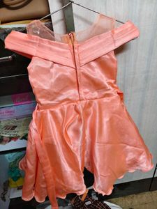 Beautiful shine frock with net shoulder cutoff