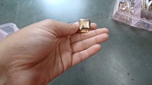 2 Pairs Of White And Gold Earings