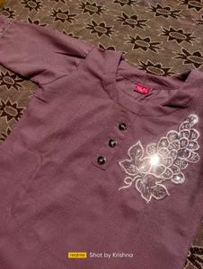 A Beautify Kurti With Beeds Work Design
