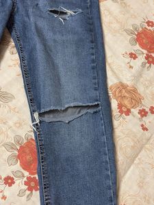 Ripped Knee Denim Jeans