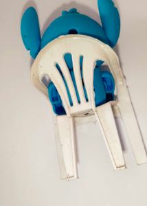 Stitch Figurine and white chair