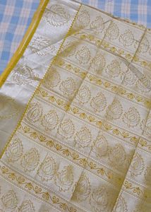 Elegant White And Green Silver Zari Saree