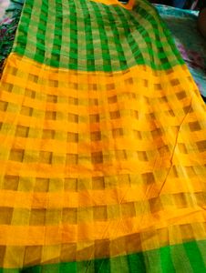 Yellow Saree  Green Blouse.