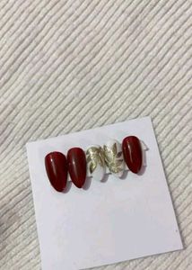 Burgundy Bow and Star Nails