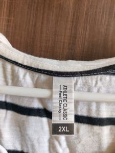 Woman&#39;s White Top With Black Strips
