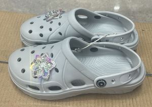 Grey Crocs with Butterfly Charms