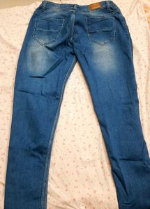 Ripped Knee Jeans