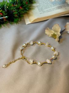 wire wrapped rose quartz and pearl bracelet