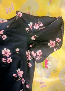 A Top , With Beautiful Floral Peach Colour Design