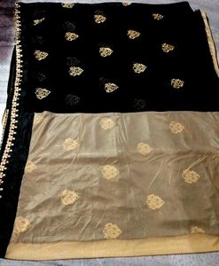 Beautiful Black And Cream Colour Georgette Saree