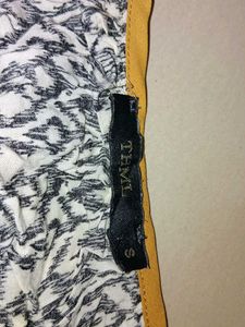 Casual too. Mix of Rayon and Polyester.