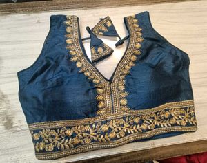 Embroidered blue blouse