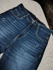 Distressed Denim Jeans