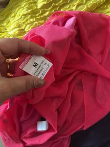 Bold Hot Pink Strapless Cutout Gown with Draped Tu