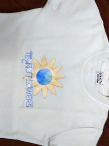 A White coloured T-shirt