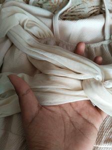 Light Pink Coloured One Piece With Bow Design At Back