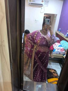 Heavy Work Purple Net Saree With Shiny Petticoat.