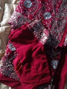 Elegant Maroon Embroidered Saree