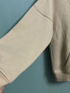 Beige Graphic Hoodie with Braided Girl Print