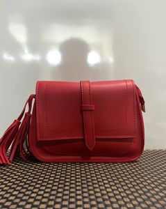 Red Sling Bag With Tassel Detailing