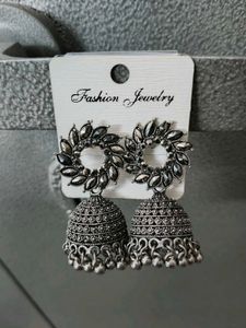 Silver Jhumka And Golden Diamond Earrings