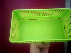 green basket bag with cover