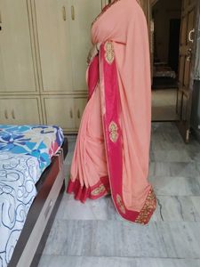 Elegant Peach Silk Sari with Equisite Border