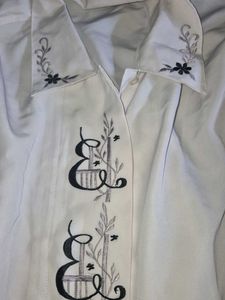 cute white shirt with embroidery