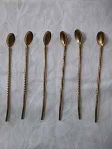 Six Long Golden Spoons
