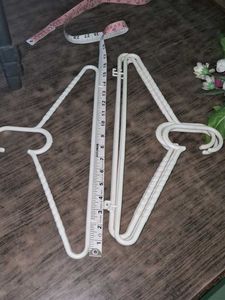 Set of 5 White Plastic Hangers