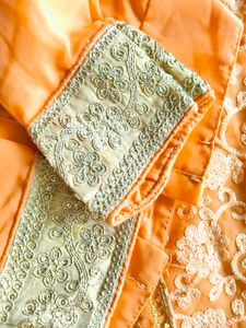 heavy peach embroidered saree