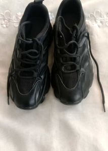 black chunky sole shoe