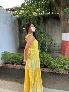 backless yellow flowy sundress