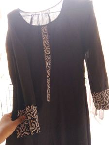 Black Skirt with Embroidered Hem