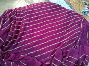 Elegant Purple Saree with Gold Accents