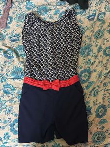 Navy Blue Sleeveless Striped Jumpsuit | Knee-Lengt