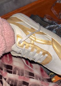 golden white shoes