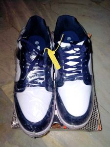 Men Colourblocked Black And White Sneakers.