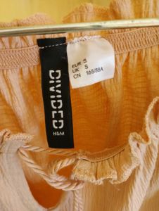 Pink Off-the-Shoulder Tassel Top