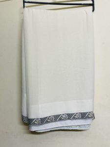 Elegant White Saree with Black Border