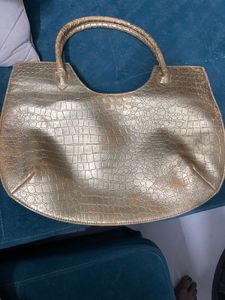 Golden party wear handbag