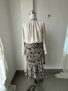 Elegant Blouse &amp; Paisley Ruffle Skirt Set