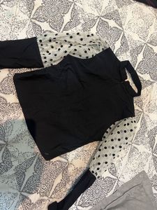 Stylish Black Top w/ Polka Dot Sleeves