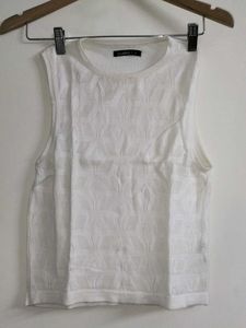 White Sleeveless Top