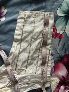 White with golden stripes detailing