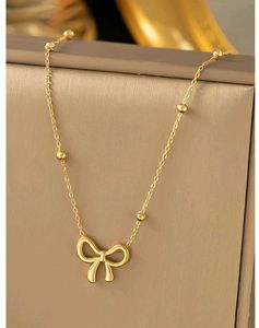 Gold Bow Pendant Necklace