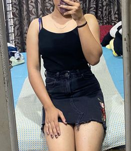 Black embroidered denim skirt
