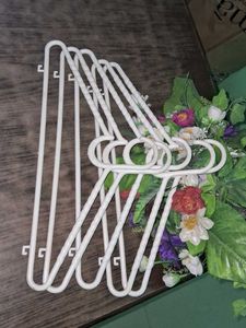 Set of 5 White Plastic Hangers